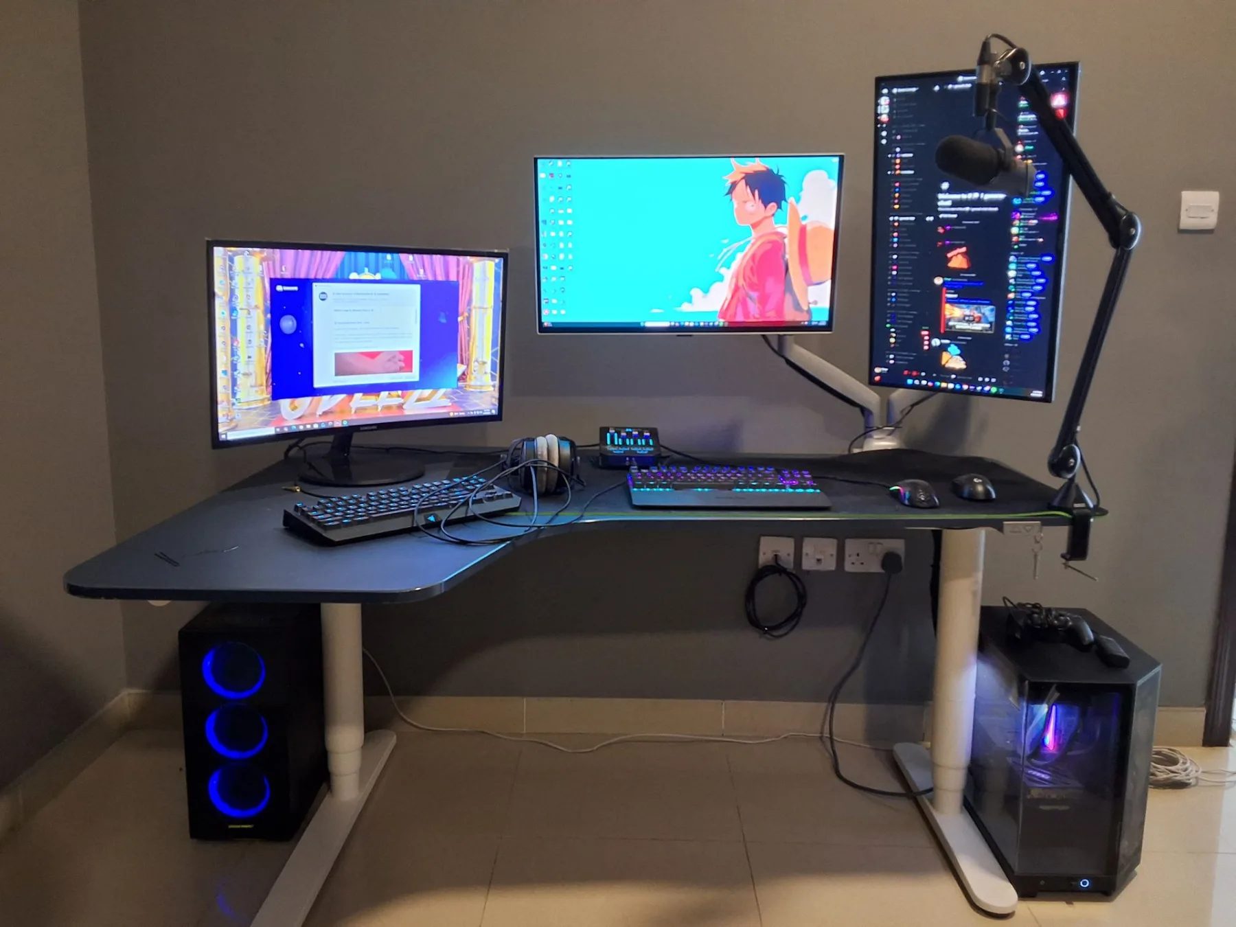 A triple-monitor streaming corner built and cable-managed by FLC